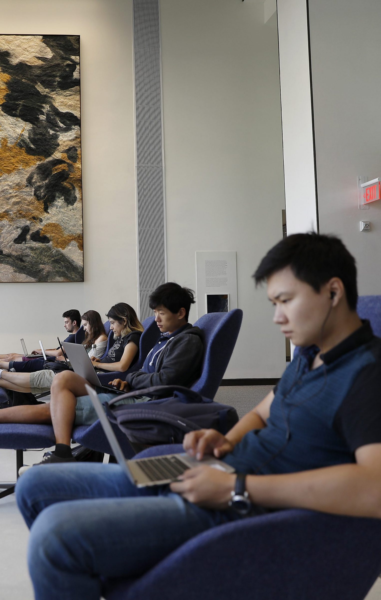 student studying in library