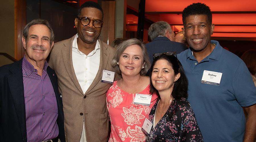 A group of Benjamin Franklin Society members at a reception at the Rubin Museum in New York City