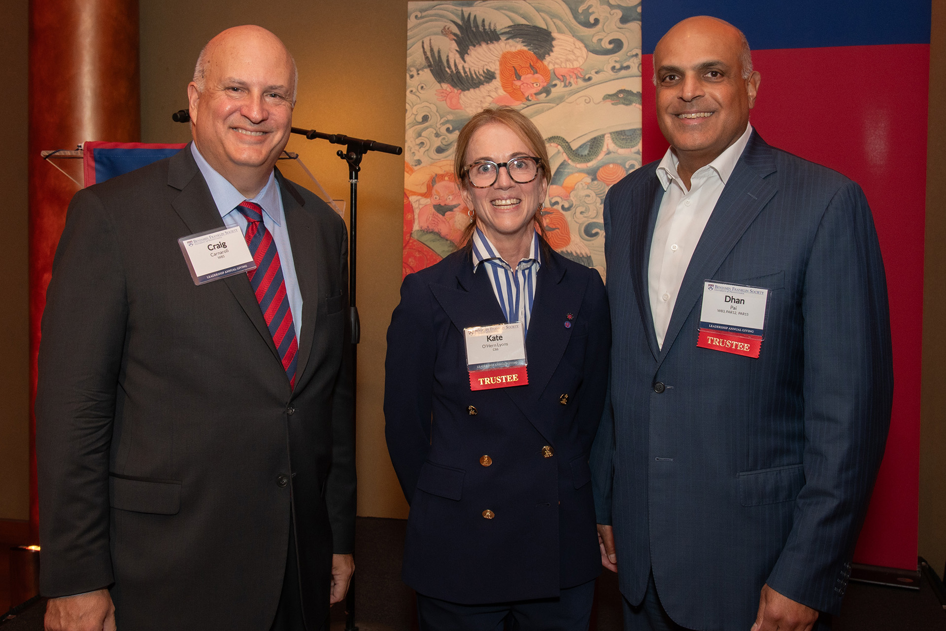 Kate O’Hern Lyons, C’86, University Trustee (at center), joined fellow University Trustee Dhan Pai, W’83, PAR’12, PAR’15 (right), for a photo along with Craig Carnaroli, Senior Executive Vice President at Penn (left)