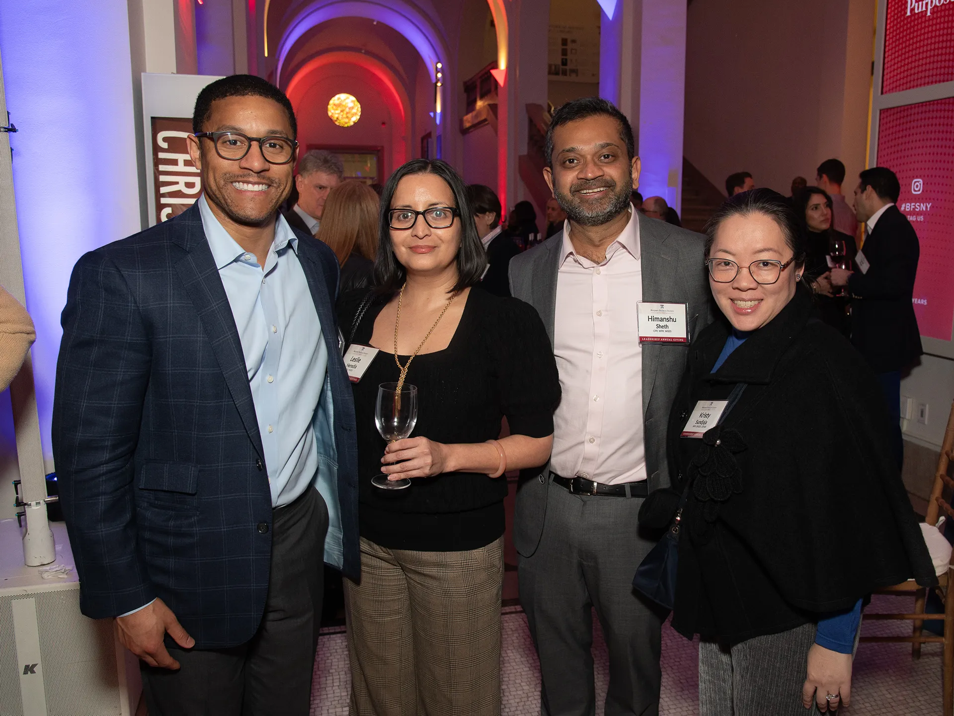 Four Benjamin Franklin Society members pose for a group photo at the Spring Reception, enjoying the evening’s networking and celebration.
